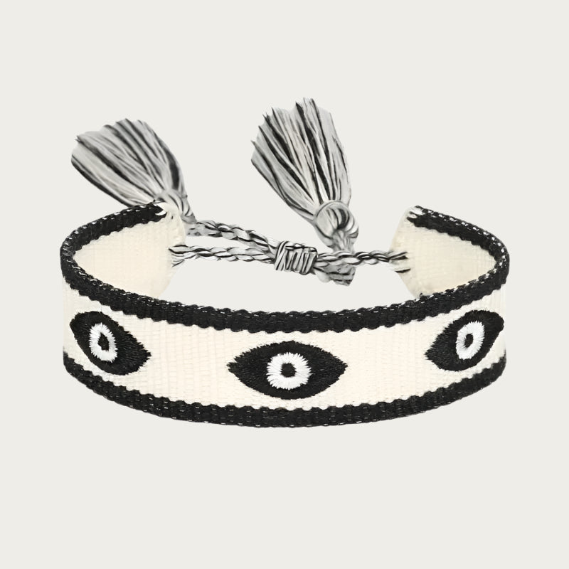 Black and white cotton bracelet with eye symbols inspired by Brazilian summer style.