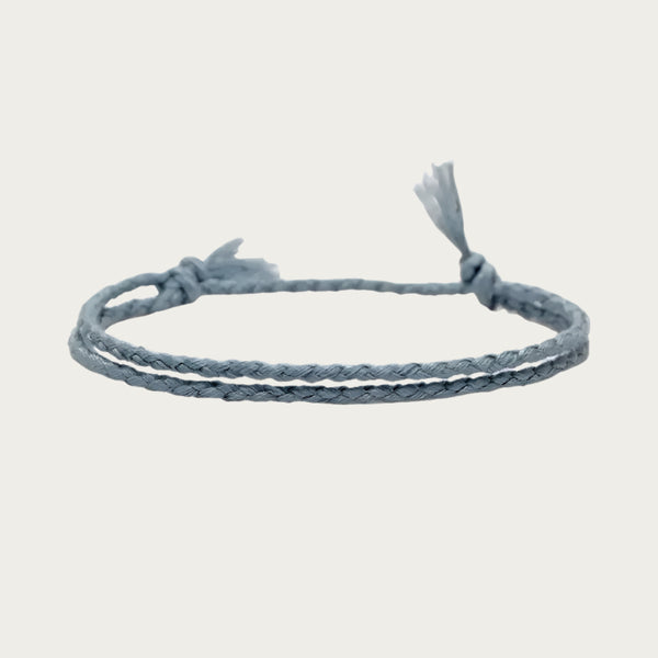 Green string cord bracelet inspired by Brazilian beach lifestyle.