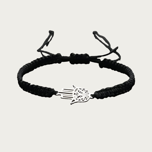 Red braided bracelet with stainless steel Hamsa pendant inspired by Brazilian summer and protection symbols.