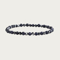 Beaded bracelet with black sandstone and silver hematite inspired by Brazilian summer style.